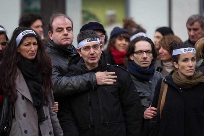 Familiares das vítimas e colaboradores do Charlie Hebdo na marcha